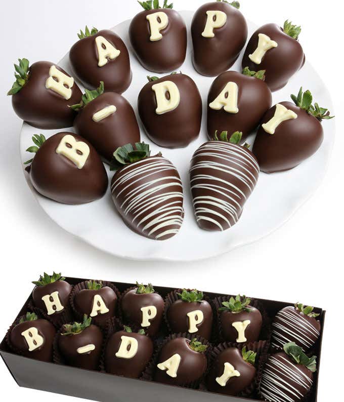 Edible arrangement featuring 12 fresh strawberries with a birthday edible message, dipped in Belgian chocolate.