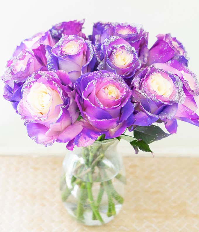 One Dozen Pastel Purple Glitter Roses in Clear Glass Vase