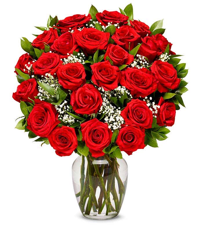  A stunning arrangement featuring 24 long stem red roses, optionally presented in a vase. This classic and romantic display is perfect for making any occasion truly special and memorable.