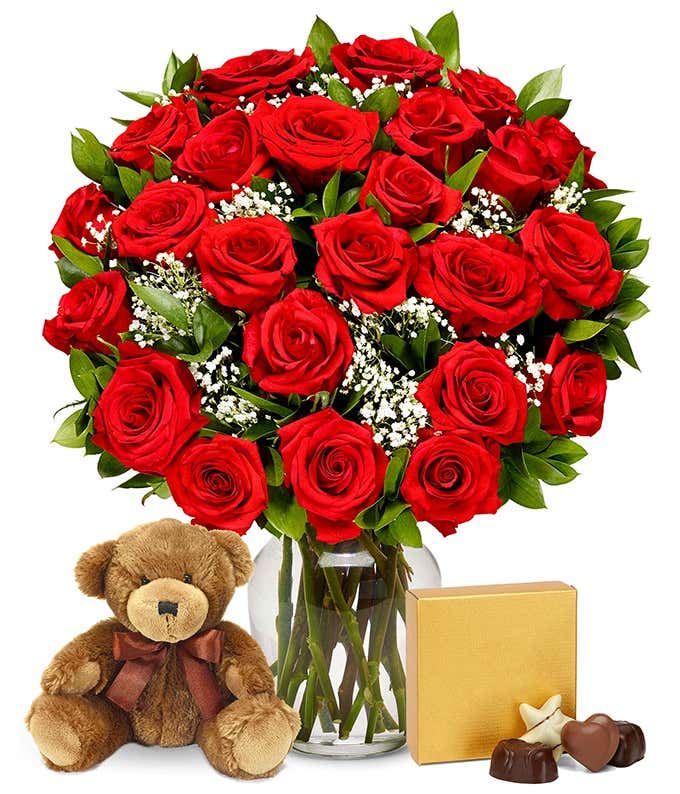 A gift set featuring 24 long stem red roses, a teddy bear, a box of chocolates, and an optional vase.