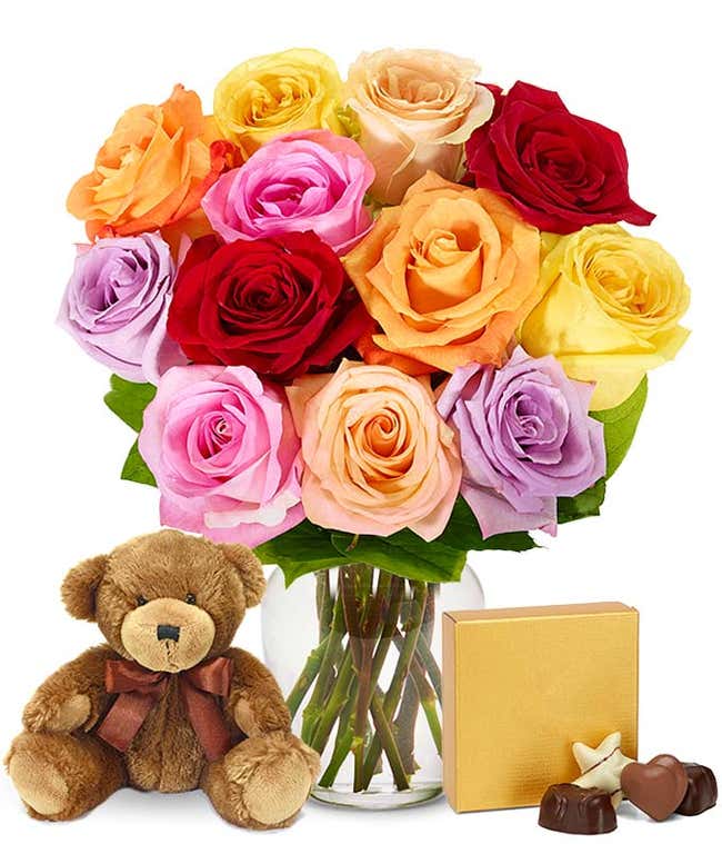 Mixed roses, teddy bear and chocolates