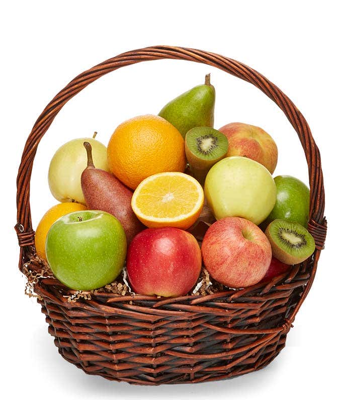 A delightful assortment of fresh fruit beautifully arranged in a woven basket.