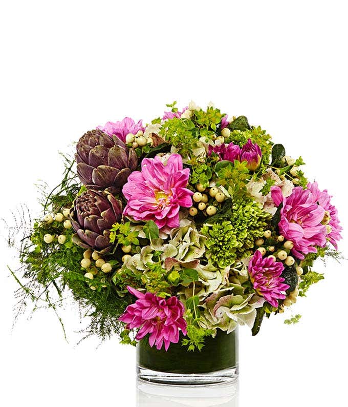 Fresh flowers in a cylinder vase