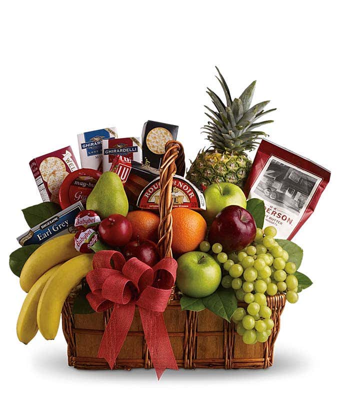 Apples, pears, orange, grapes, bananas & pineapple with cheese, crackers, tea & other savory snacks in a natural gift basket with a bow.